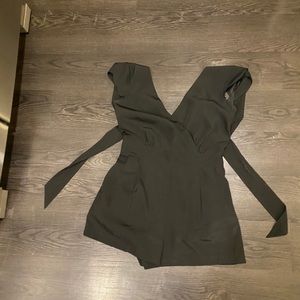 Jumpsuit and tie bow on back